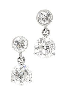 A Pair of White Gold and Diamond Drop Earrings, 1.30 dwts.