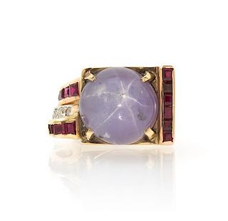 A Retro Yellow Gold, Star Sapphire, Ruby and Diamond Ring, 8.40 dwts.