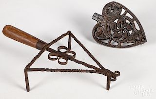 Two wrought iron trivets