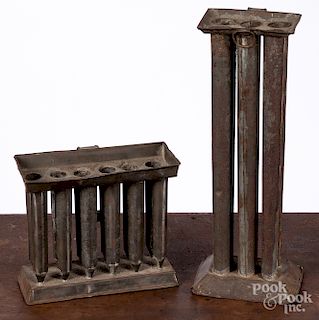 Two tin candle molds