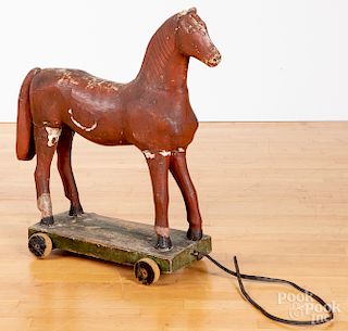 Large carved and painted horse pull toy