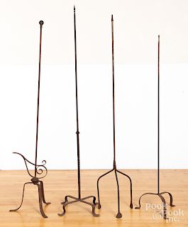 Four wrought iron stands