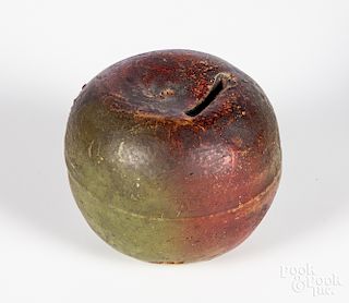 Painted redware apple still bank