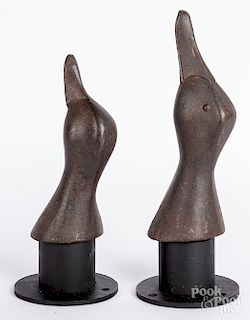 Two cast iron duck head machine die molds