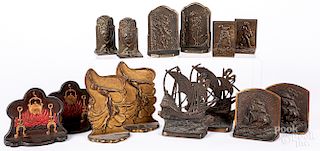 Seven pairs of cast iron bookends