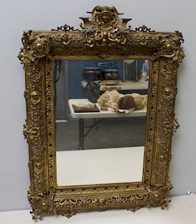 Antique Rococo Brass Mirror With Figural Crown.