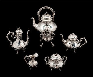 A French Silver and 18-Karat Gold Five-Piece Tea and Coffee Service