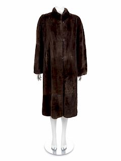 A Long Brown Fur Coat with button and loop closure, 1970's-1980's