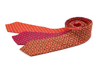 Three Hermes ties, two red, one khaki with orange pattern