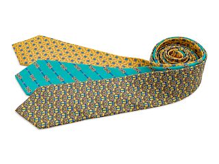 Three Hermes ties, two yellow, one turquoise