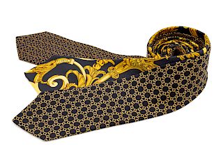Three Hermes ties, all three black with yellow patterns