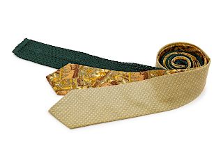 Three Hermes ties, one pale yellow, one yellow and brown animal print, one dark green knit