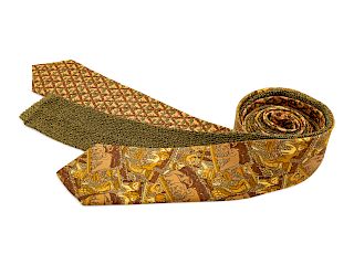 Three Hermes ties, one peach with bamboo print, one yellow and brown animal print, one olive green knit