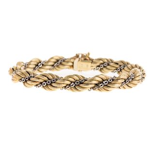 A Ladies Italian Rope Bracelet in 14K Gold