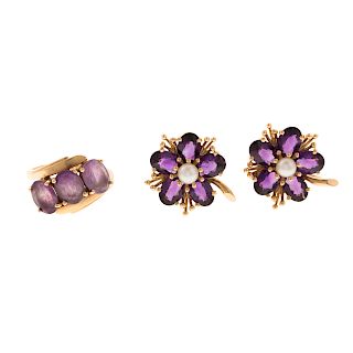 A Pair of Amethyst Earrings and Ring in Gold
