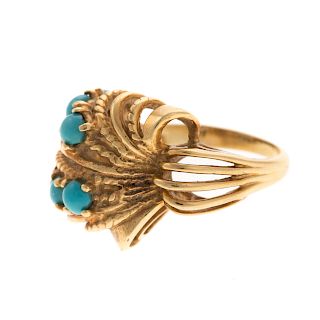 A Ladies Freeform Turquoise Ring in 18K