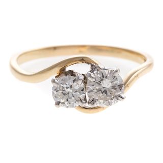 A Ladies Vintage Diamond Bypass Ring in 14K