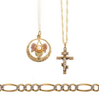 A Gent's Gold Bracelet & Two Chains & Pendant'