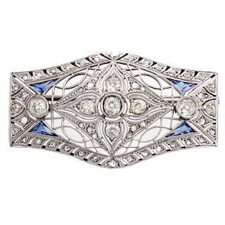 A Ladies Vintage Diamond Brooch in Platinum
