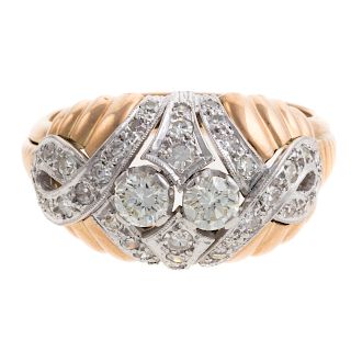 A Ladies Diamond Dome Ring in 18K Gold