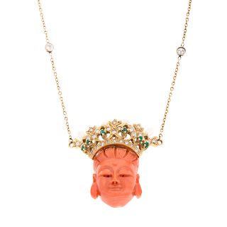 A Ladies Carved Coral Pendant with Diamonds in 14K