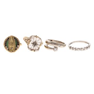 A Collection of Rings in Gold with Diamonds
