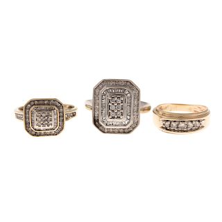 A Trio of Diamond Ring and Bands in Gold