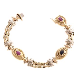 A Ladies Multi Colored Gemstone Bracelet in 14K