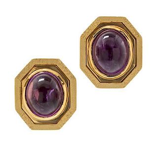 A Pair of 14 Karat Yellow Gold and Amethyst Earclips, 8.10 dwts.