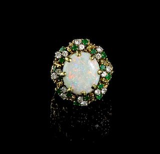 * An 18 Karat Yellow Gold, Opal, Emerald and Diamond Ring, 17.70 dwts.