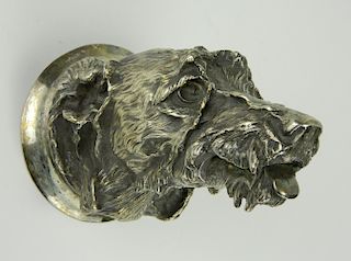 Silver over bronze sculpture of a dog's head