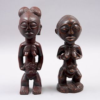 Par de deidades de la fertilidad. Origen Africano, siglo XX. Tallas en madera entintada. Piezas: 2