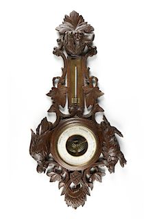 A FRENCH BLACK FOREST STYLE CARVED WOOD BAROMETER ANEROID, EARLY 20TH CENTURY,