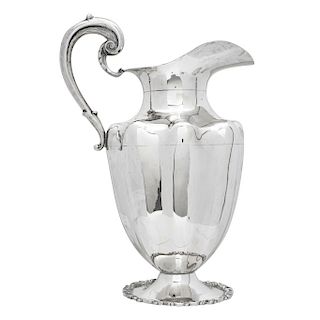 JUG. MEXICO, 20TH CENTURY. Sterling 0.925 Silver. Smooth and pressed design. Decored with vegetal motifs. 