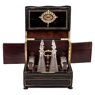 DECANTER BOX. FRANCE, 19TH CENTURY. Napoleon III Style. Ebonized wood with mother-of-pearl and brass details.
