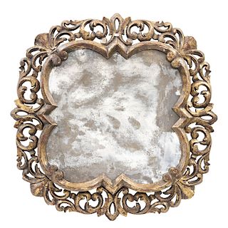 MIRROR. MEXICO, CIRCA 1900. Golden wood, carved with designs shaped acanthus leaves, moon with three layers of platinum.