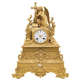 MANTEL CLOCK. FRANCE, 19TH CENTURY. Golden bronze. Central figure: an angel in front of the cross.