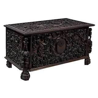 COFFER. 1900. SPANISH style. Carved wood with ironwork. Decorated with a religious scene.