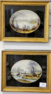 Pair of reverse glass paintings, lake scenes with oval black surround, 19th century, 8 1/4" x 10".