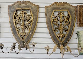 Pair of shield shaped decorative candle sconces with mirror backs. ht. 31 in., wd. 19 in.