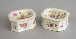 Pair of Chinese export famille rose porcelain salts, painted with flowers, circa 1765. lg. 3 1/4 in.