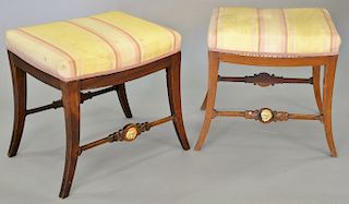 Pair of continental mahogany and parcel gilt stools, 19th century, silk seat on splayed legs joined by stretchers centering masks. h...