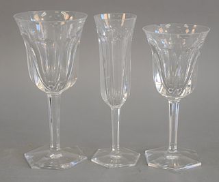 Three piece group of Baccarat stemware service to include ten white wine glasses, twenty red wine glasses, and eleven champagne flut...