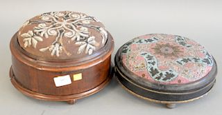 Two victorian footstools with beadwork cushions. ht. 3 1/2 in. and 6 1/4 in., dia. 11 in. and 11 1/2 in.
