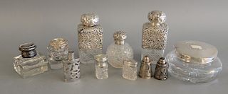 Eleven piece lot of silver overlay and silver topped crystal bottles, inkwell with bird finial, broken but available.