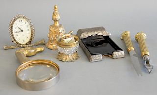 Tray lot with heavy gilt bell, equestrian magnifying glass with horse head handle, table lighter, globe desk alarm clock and silver ...