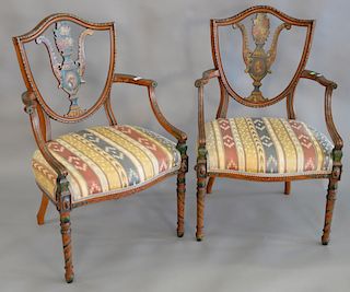 Pair of Edwardian Adams mahogany shield-back open arm chairs with painted leaf and flower design. ht. 38 1/2 in., wd. 20 in., dp. 20...