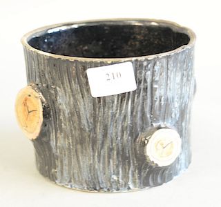 Stoneware glazed log pot with cut tree branches form on a stump. ht. 5 in., dia. 6 1/2 in.
