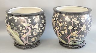 Pair of Chinese porcelain jardinieres on wood stands. ht. 15 1/2 in., dia. 15 1/4 in.