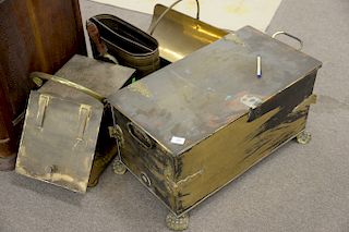 Four piece brass lot to include rectangular hinged covered box on paw fee, coal hod and log holder and a holder with lion head handl...